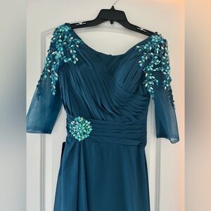 Elegant Teal Evening Dress with Embellished Sleeves